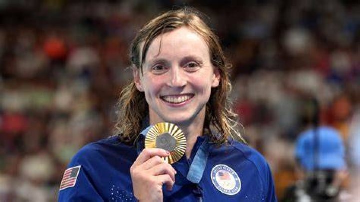 Olympic Swimmer Katie Ledecky Throws Out the First Pitch! Photo